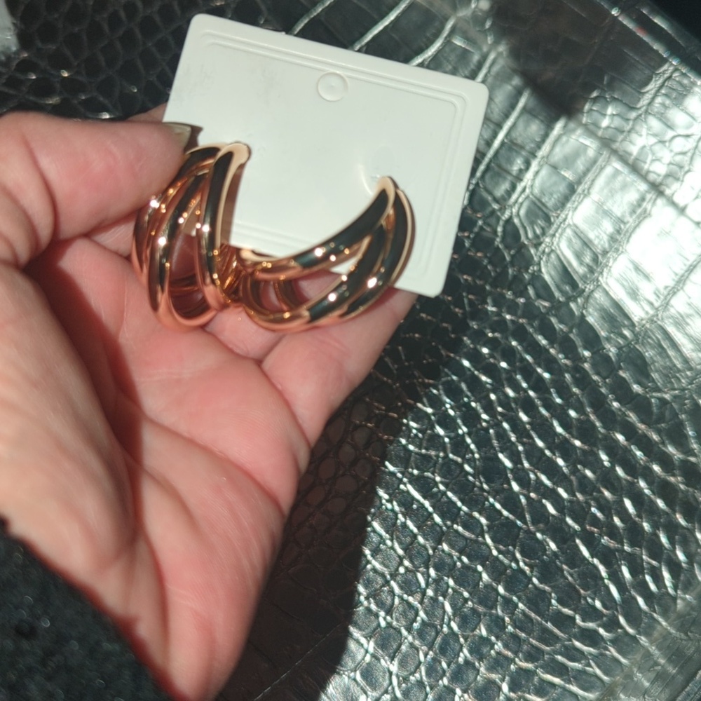 Pierced Gold tone earrings